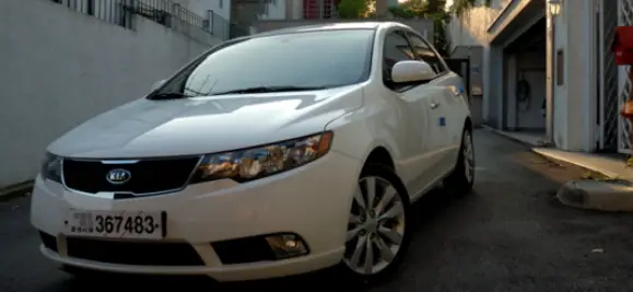 kia-forte-white-1.jpg
